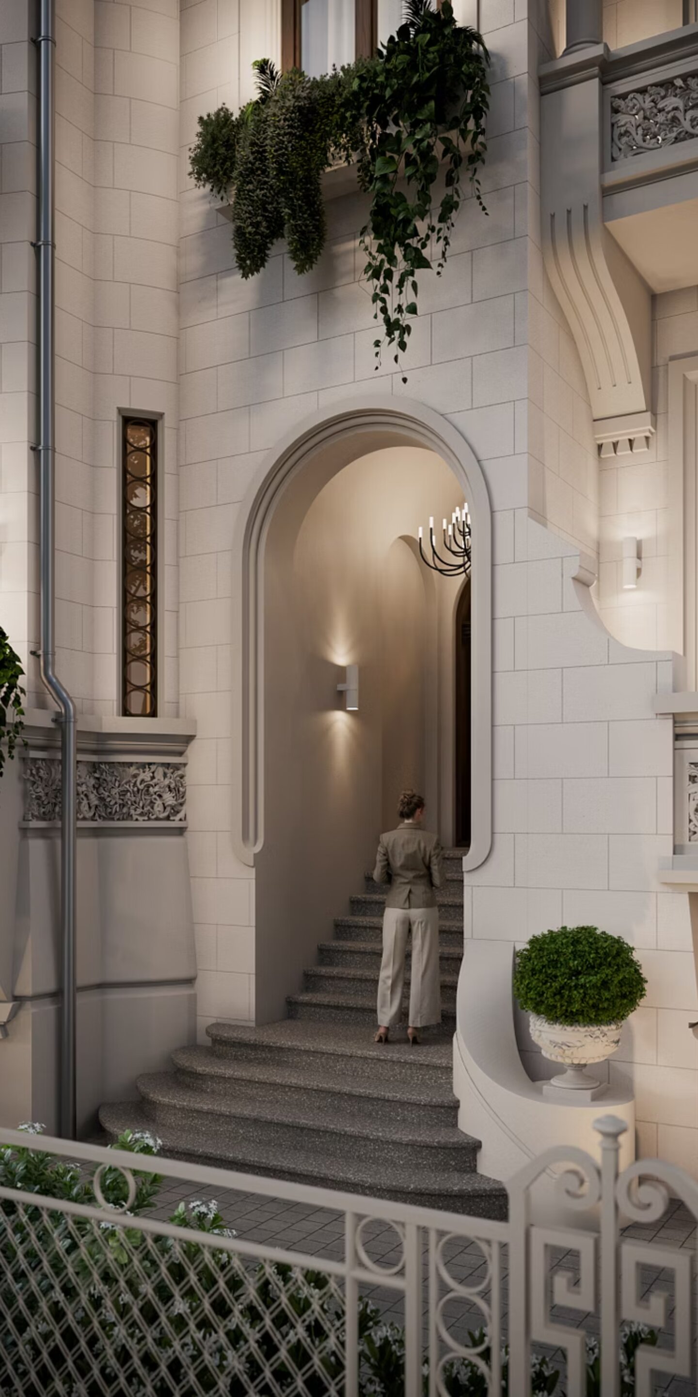 The arched main entrance of Paris 39 at dusk, with soft internal lighting and a figure ascending the stairs